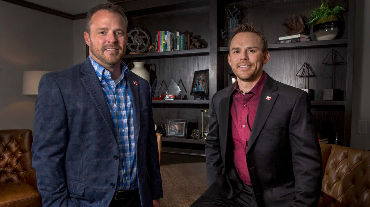 Mike, left, and Brandon Converse make up the Converse Team, financial advisers who are up for a Wichita Chamber small business award. (April 23, 2019)