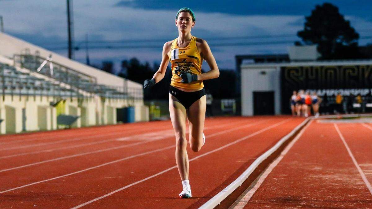 Before she became an All-American at Wichita State, Rebekah Topham was the first girl in Iowa history to win four straight cross country state championships