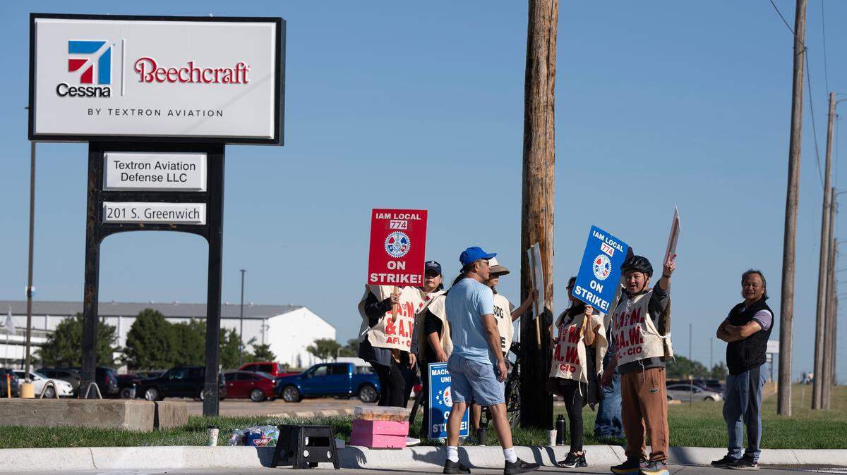 Striking Textron employees picket in front of the facility on Greenwich Road. Around 5,000 members of the IAM Local Lodge 774 are on strike after rejecting the company’s latest contract offer on September 21, 2024, and voted to go on strike.
