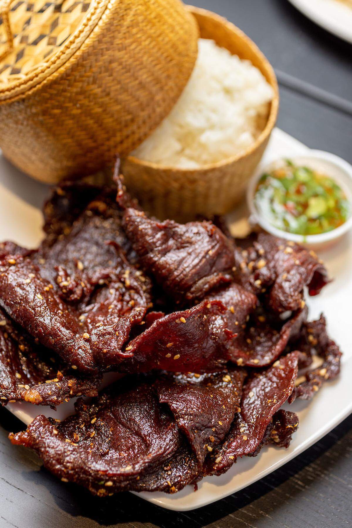 Laotian beef jerky and sticky rice is a specialty at Bella’s Beef Jerky & Cafe, which recently opened on South Rock Road.