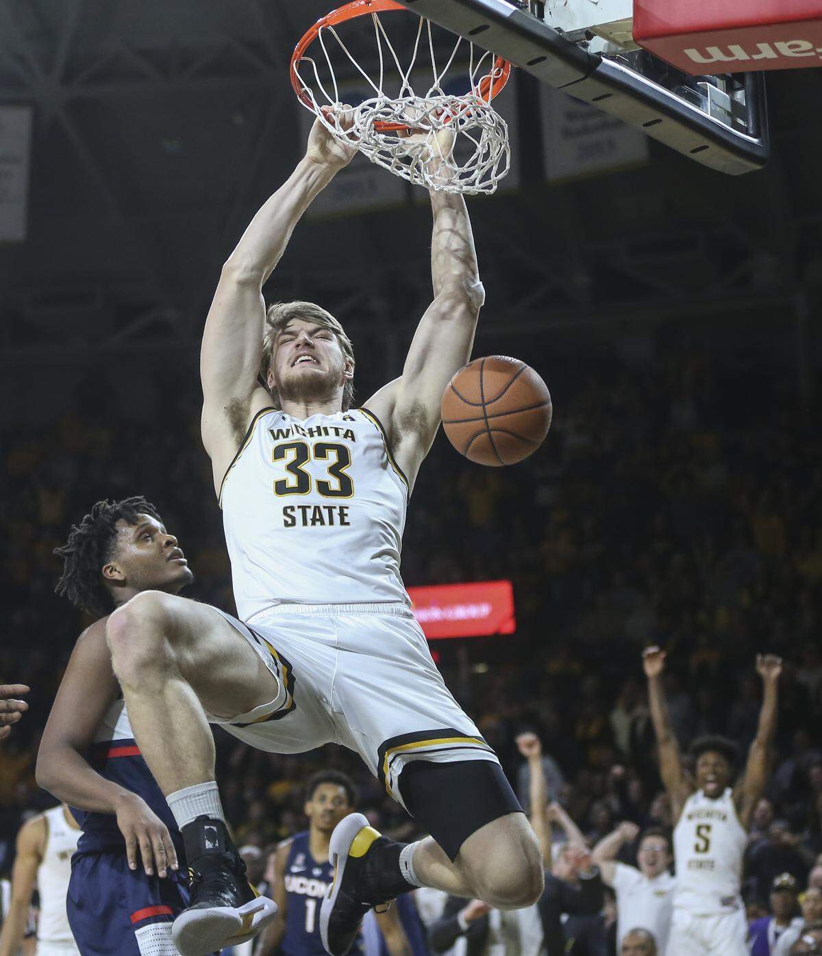Wichita State center Asbjorn Midtgaard dunks during the second half of their game against Connecticut at Koch Arena on Thursday.