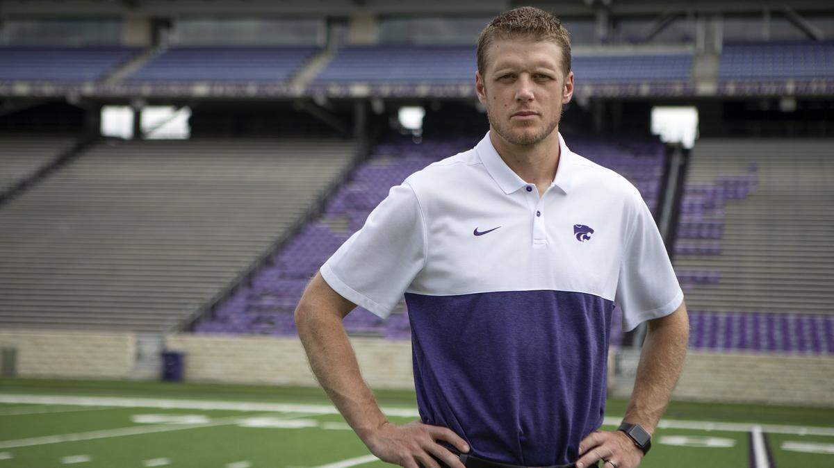 Kansas State quarterback coach Collin Klein poses for a portrait at Bill Snyder Family Stadium on Saturday, Aug. 9, 2019.