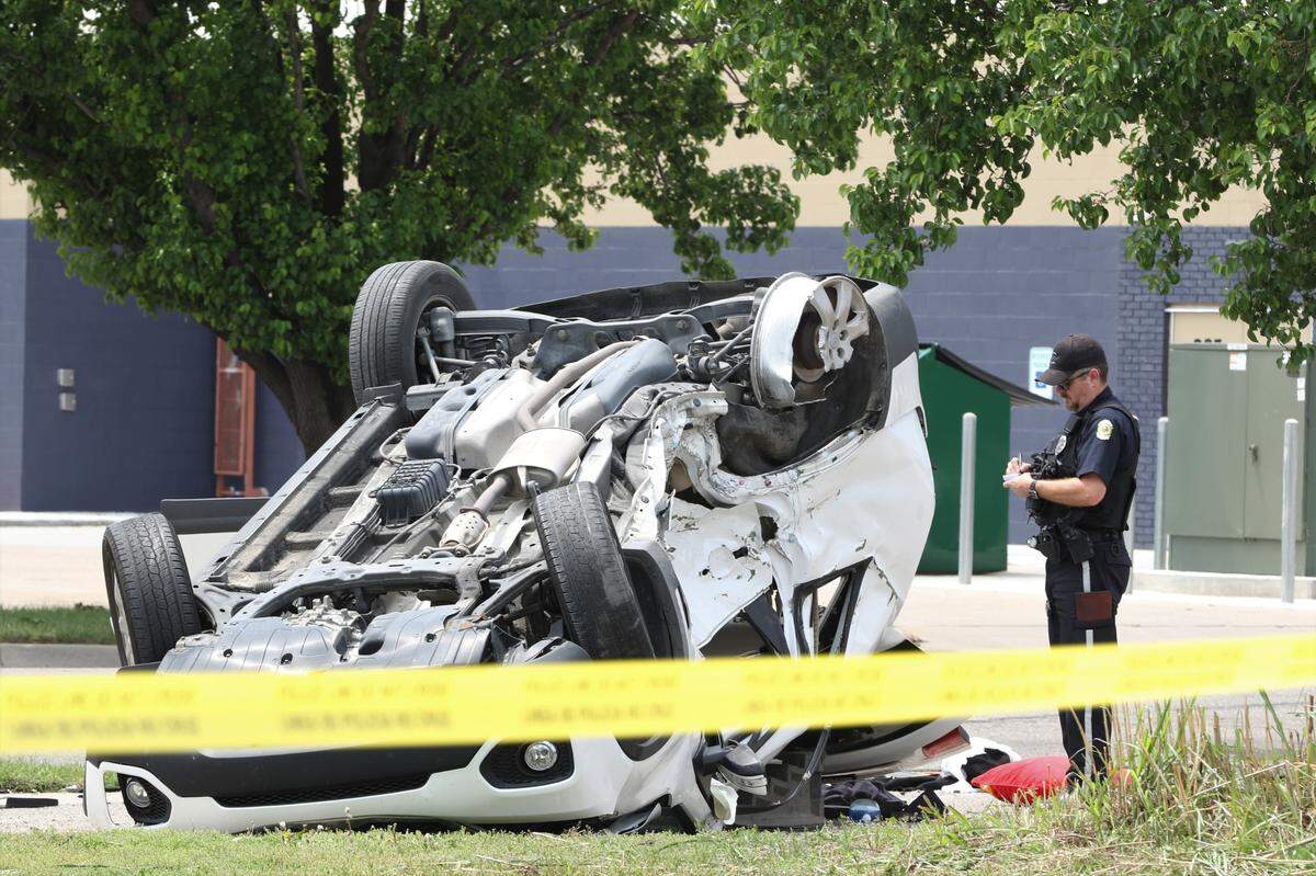 A white vehicle overturned into a lot near downtown Wichita. The accident on Murdock sent eight people to the hospital Monday shortly before noon.