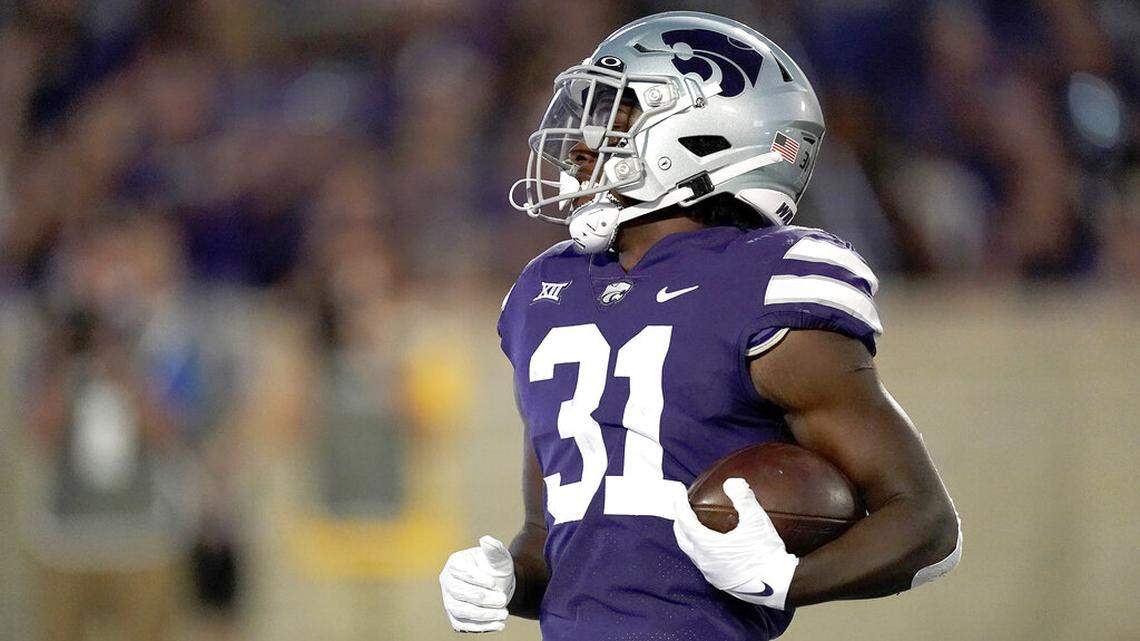 Kansas State running back DJ Giddens runs for a touchdown during the second half of an NCAA college football game against South Dakota Saturday, Sept. 3, 2022, in Manhattan, Kan. (AP Photo/Charlie Riedel)