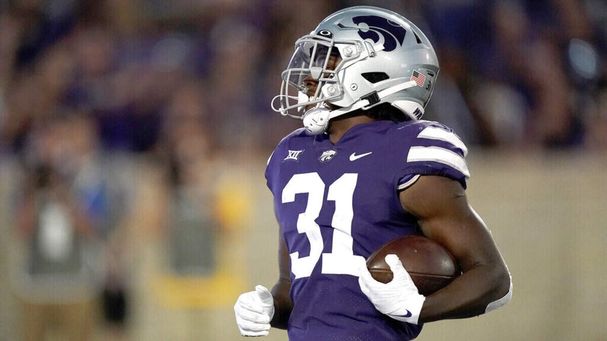 Kansas State running back DJ Giddens runs for a touchdown during the second half of an NCAA college football game against South Dakota Saturday, Sept. 3, 2022, in Manhattan, Kan. (AP Photo/Charlie Riedel)
