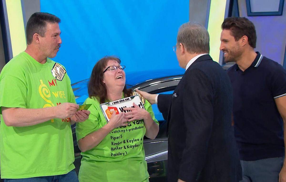 Melinda McBride, second from left, was the big winner on an episode of “The Price is Right” that aired on Tuesday but was filmed in early February. Her husband, David, left, joined her on stage after she won.