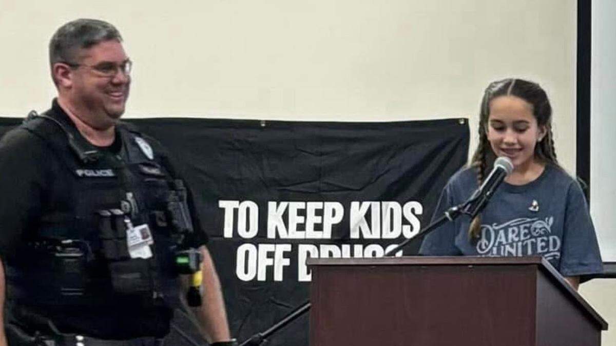 Student Resource Officer Paul Millard attends a DARE graduation at Park Elementary in Great Bend. Millard teaches DARE, or Drug Abuse Resistance Education, to students.