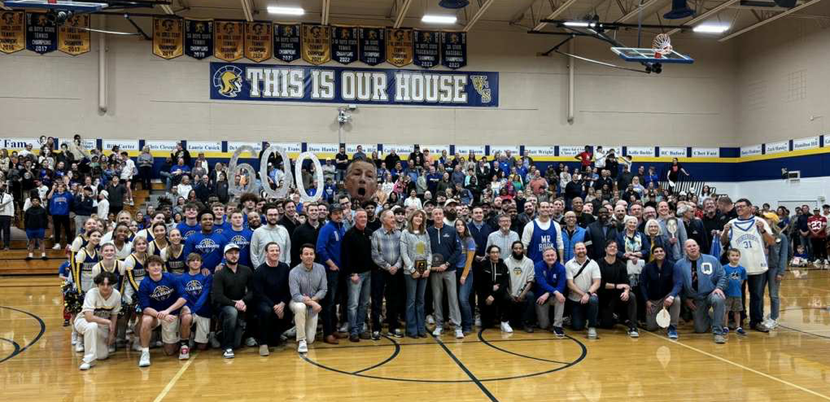 Around 100 former players, including Maurice Evans, all returned to Collegiate to pay their respect to coach Mitch Fiegel after he won his 600th career game with the Spartans last February.