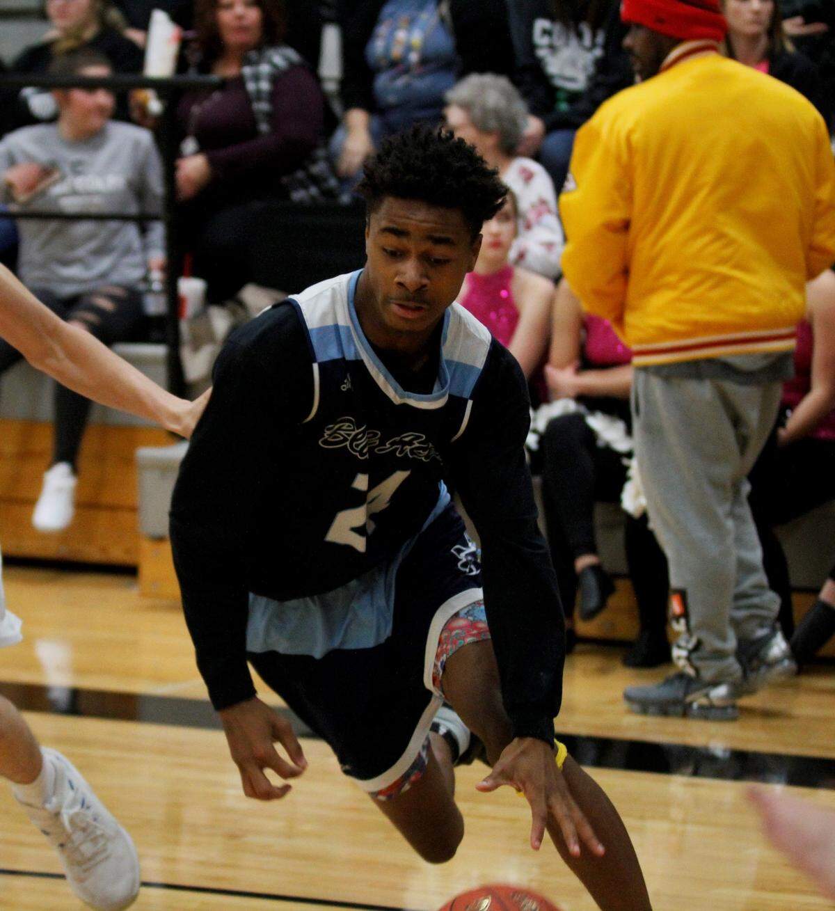 Wichita East junior Amos Alford Jr. drives past Campus’ Thomas King during the Aces’ 75-47 loss Saturday to the Colts on Saturday in the AVCTL/GWAL Challenge. (Jan. 12, 2019)