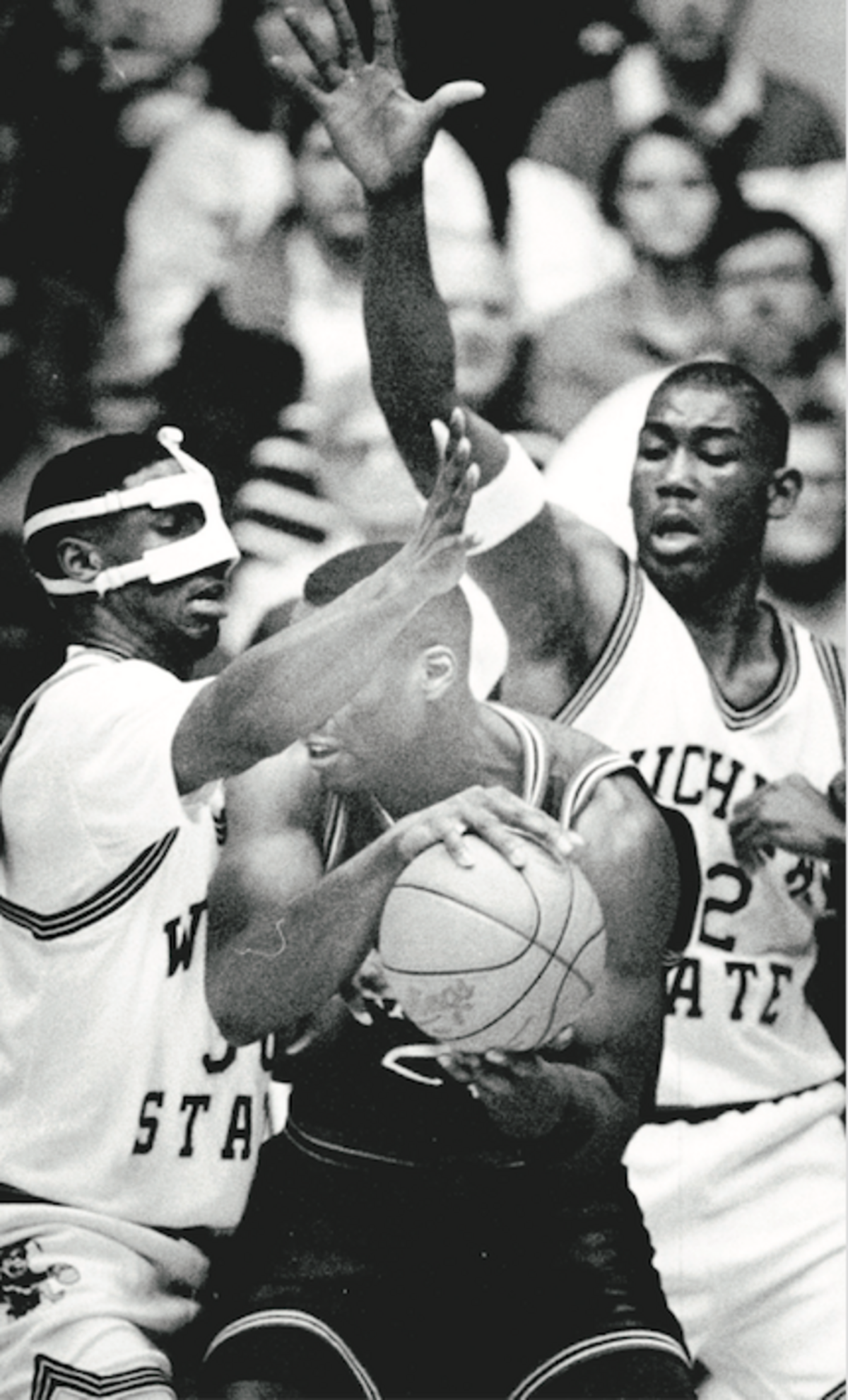 Michael Wiggins (left) is a former Wichita State basketball player who suited up for the Shockers from 1990-93. WSU offered his son, Chauncey, a four-star class of 2022 prospect last week.