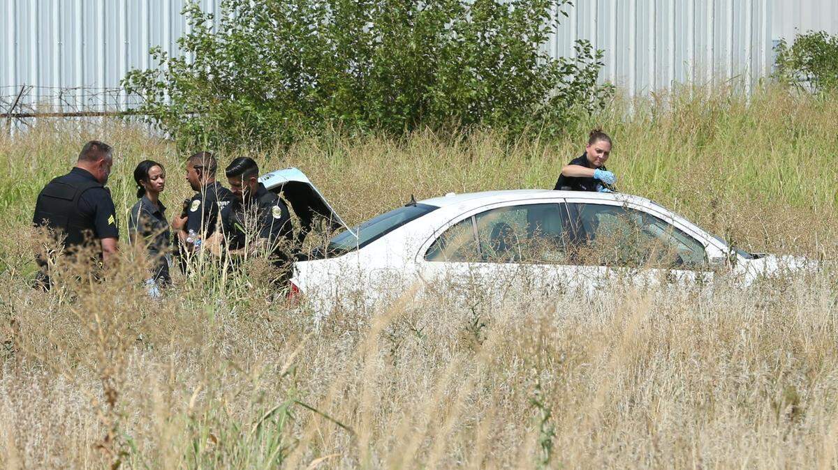 A man’s body was found inside the trunk of a white four-door car parked in a field near Dwight D. Eisenhower airport on Aug. 21.