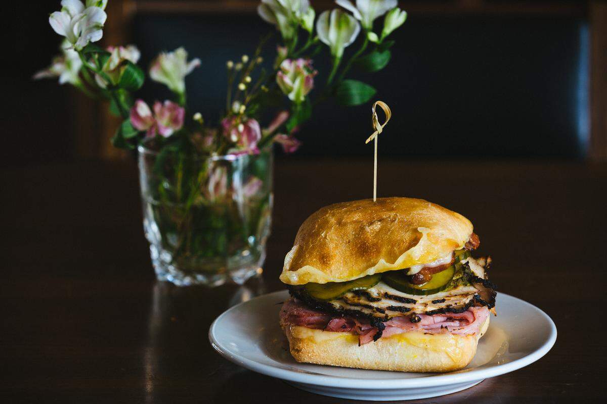 The new Cuban sandwich, made with coffee-rubbed pork loin, at Reverie Coffee Roasters