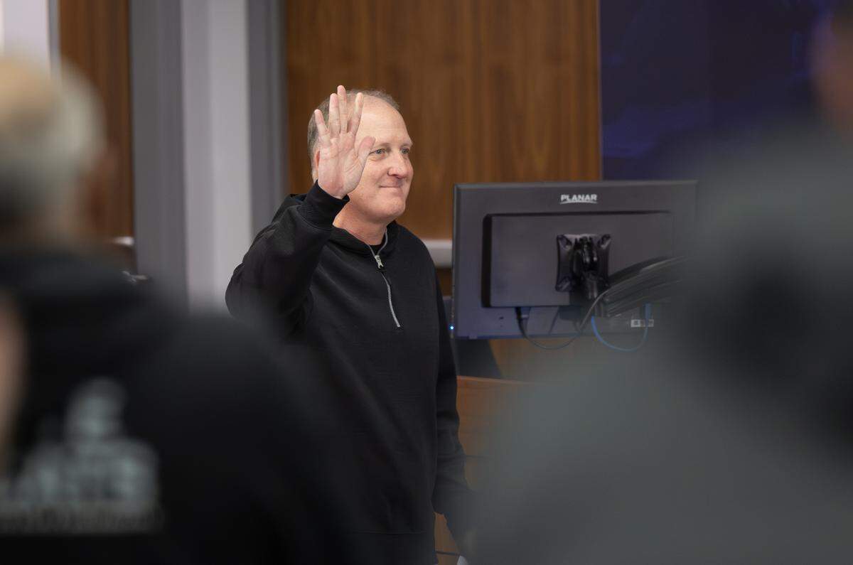 Kansas State football coach Chris Klieman received a standing ovation from fellow KSU coaches when he walked into a news conference at Bill Snyder Family Stadium on Wednesday, Dec. 3, 2025 to announce his retirement from coaching.