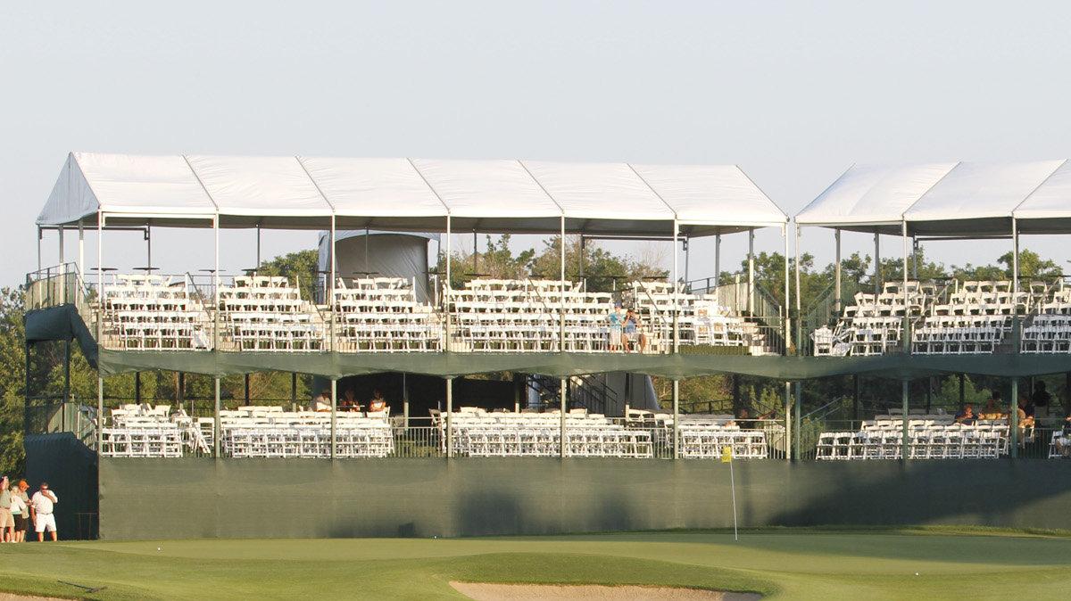 A large crowd walks to the 17th hole during the Scholfield Hyundai Shootout, a kickoff event for the Preferred Health Systems Wichita Open at Crestview Country Club. (June 18, 2012)