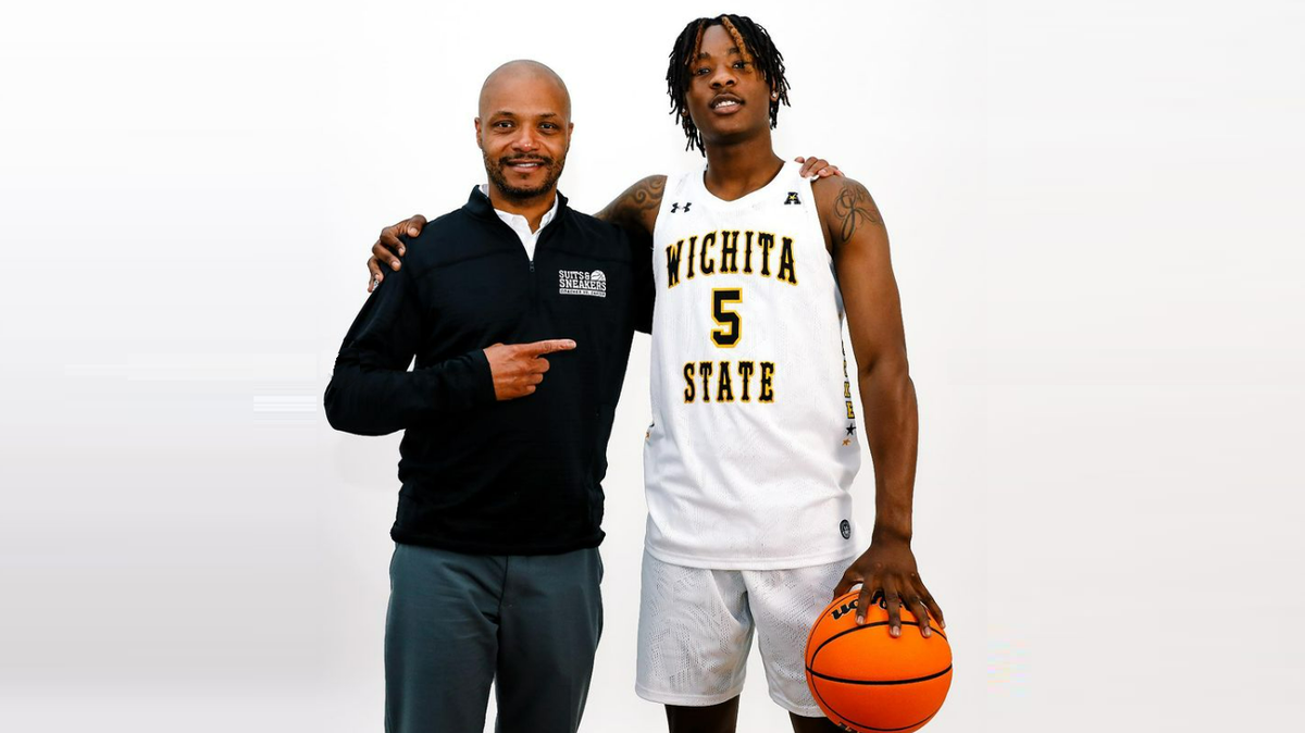 Wichita State basketball coach Isaac Brown and his newest recruit, Jaron Pierre Jr., pose for a picture on his official visit. Pierre committed to the Shockers on Saturday night.