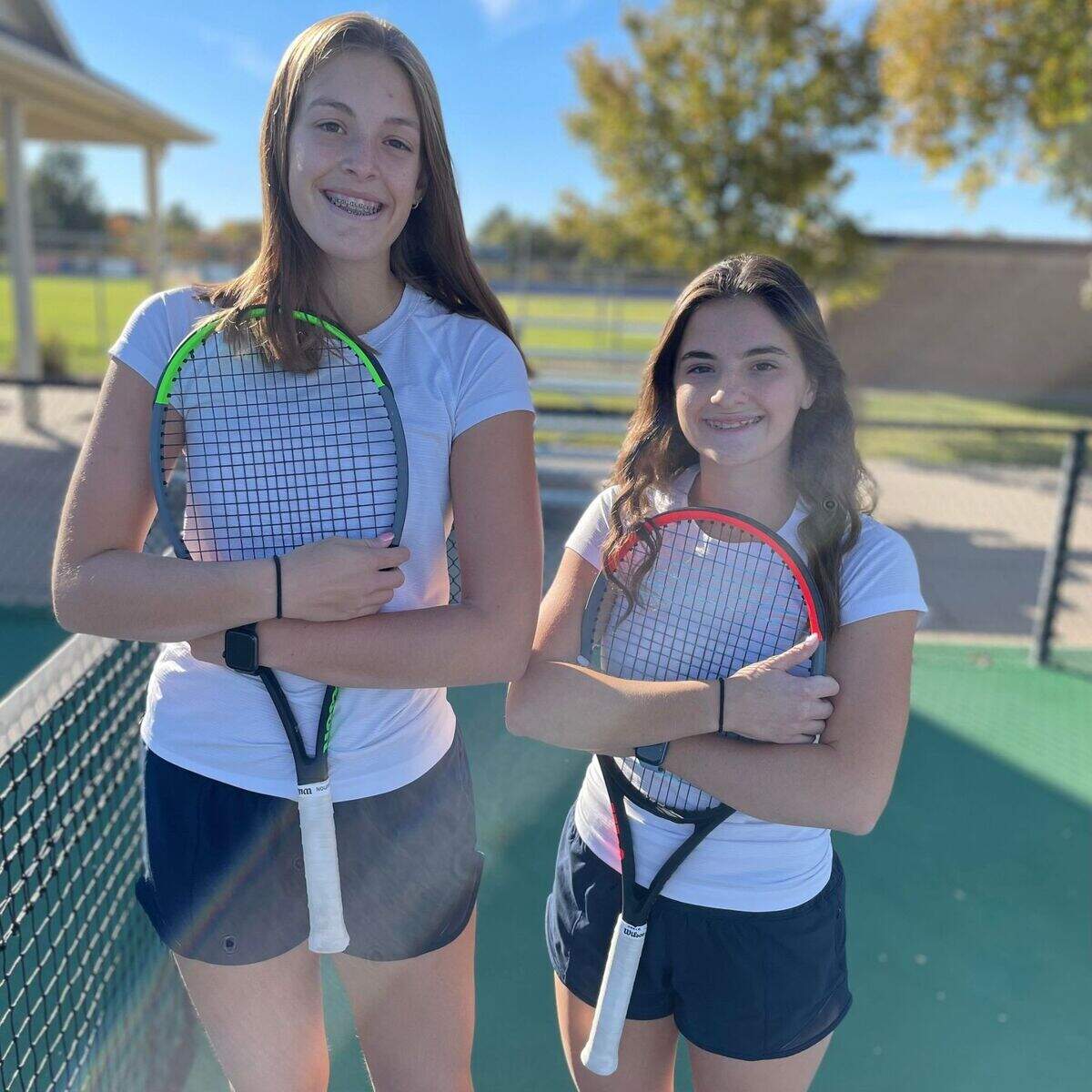 The Collegiate doubles team of Julia Herrman (left) and Laney Conrad (right) were three-time All-Metro selections.