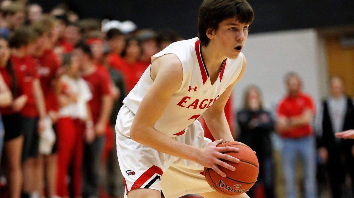 Maize’s Kyle Grill scored a game-high 24 points to lead the Eagles to a 77-70 victory over No. 1-ranked Andover, snapping Andover’s 30-game winning streak.