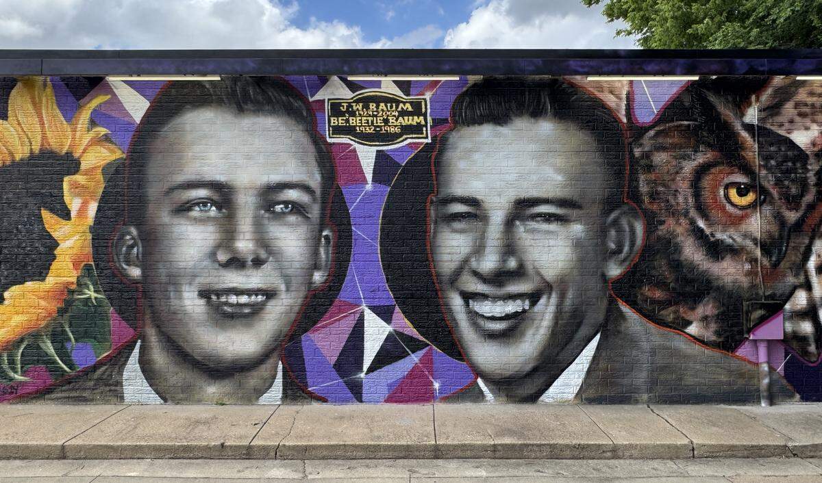 This mural of J.W. and B.E. “Beetle” Baum was painted by artist Emmanuel Campos-Perez — who prefers to go by his artistic signature of Deber614. It’s one of 15 murals he is painting around Wichita.