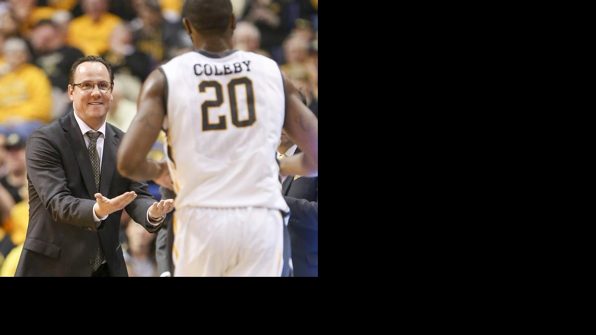 Wichita State coach Gregg Marshall greets Kadeem Coleby as he comes out of the game against Evansville during the MVC Tournament in St. Louis. (March 7, 2014)

