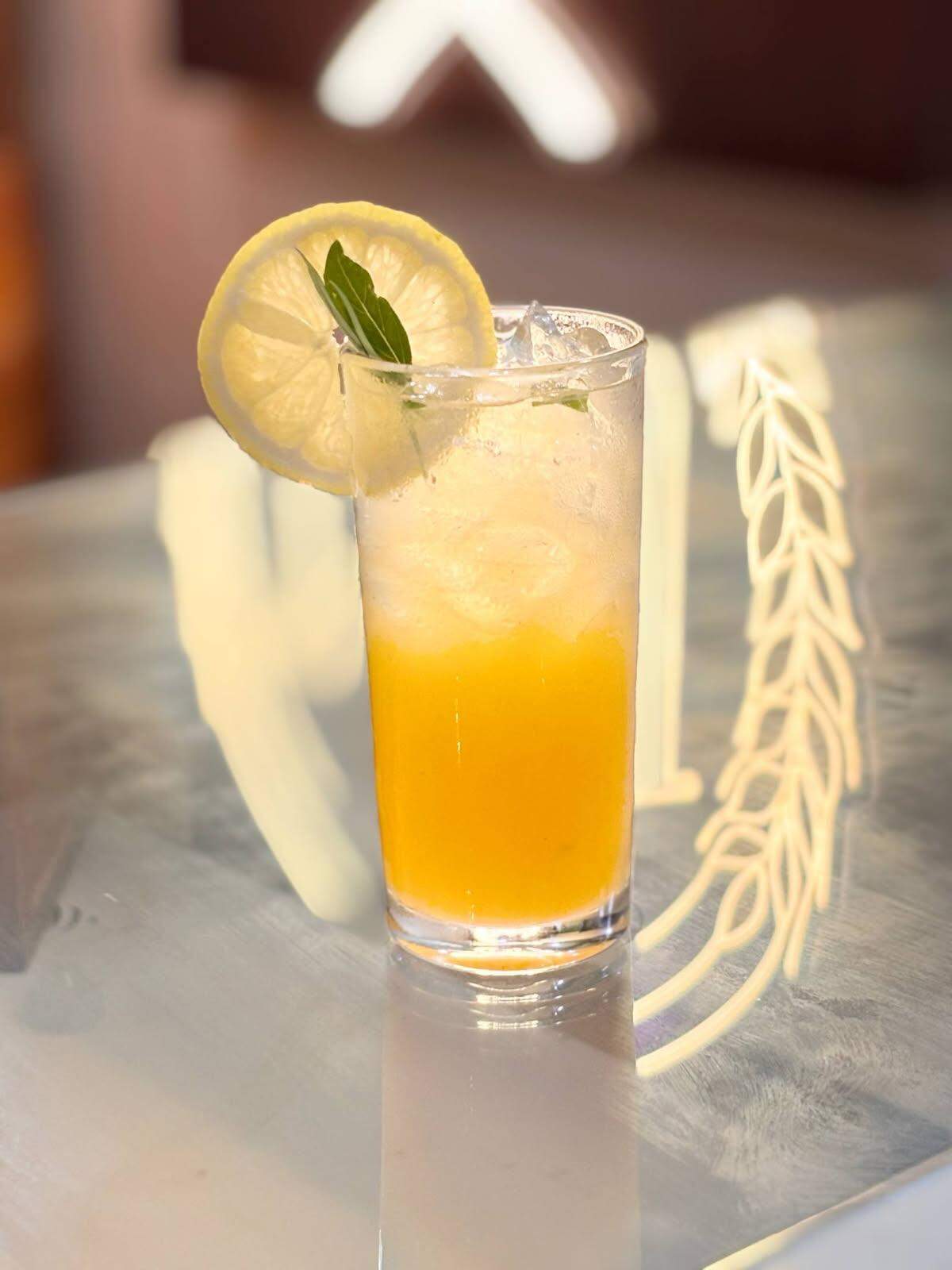 N&J Mediterranean Bar & Grill at 8448 W. Central will have a full bar and its own menu of craft cocktails. Pictured is a drink called The Golden Hour that’s made with white rum, mango juice, lemon juice, orange blossom honey, orange bitters, basil and sparkling water.