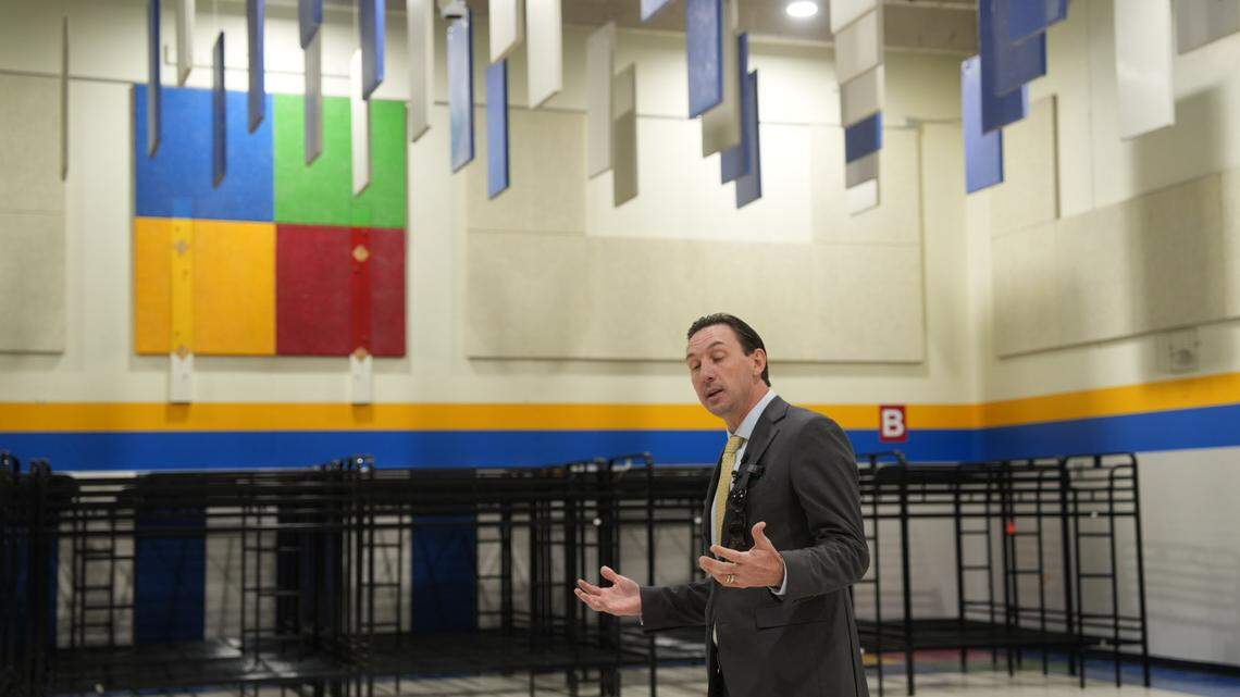 Assistant City Manager Troy Anderson gives a tour of the new emergency winter shelter to media. 