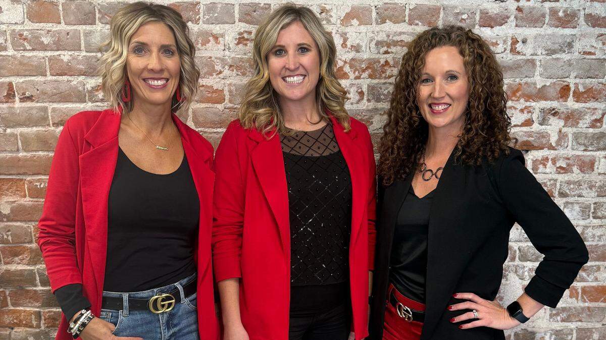Stefanie Roth, left, and Jessica Holle, right, have joined Rachel Lange-Mills and the Lange Real Estate residential team, which is opening a new west-side office this week.