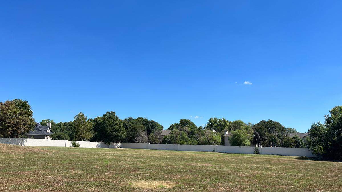 Minnesota-based Real Estate Equities Development wants to bring one of its Village Cooperative communities near the northeast corner of 21st and Webb Road, just east of where Opti-Life closed in May.