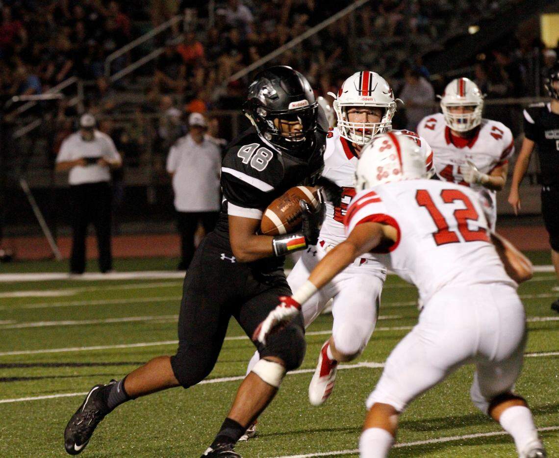 Campus senior tight end and linebacker Quinton Hicks makes a cut during the Colts’ 21-0 loss to Maize on Friday night. (Sept. 14, 2018)