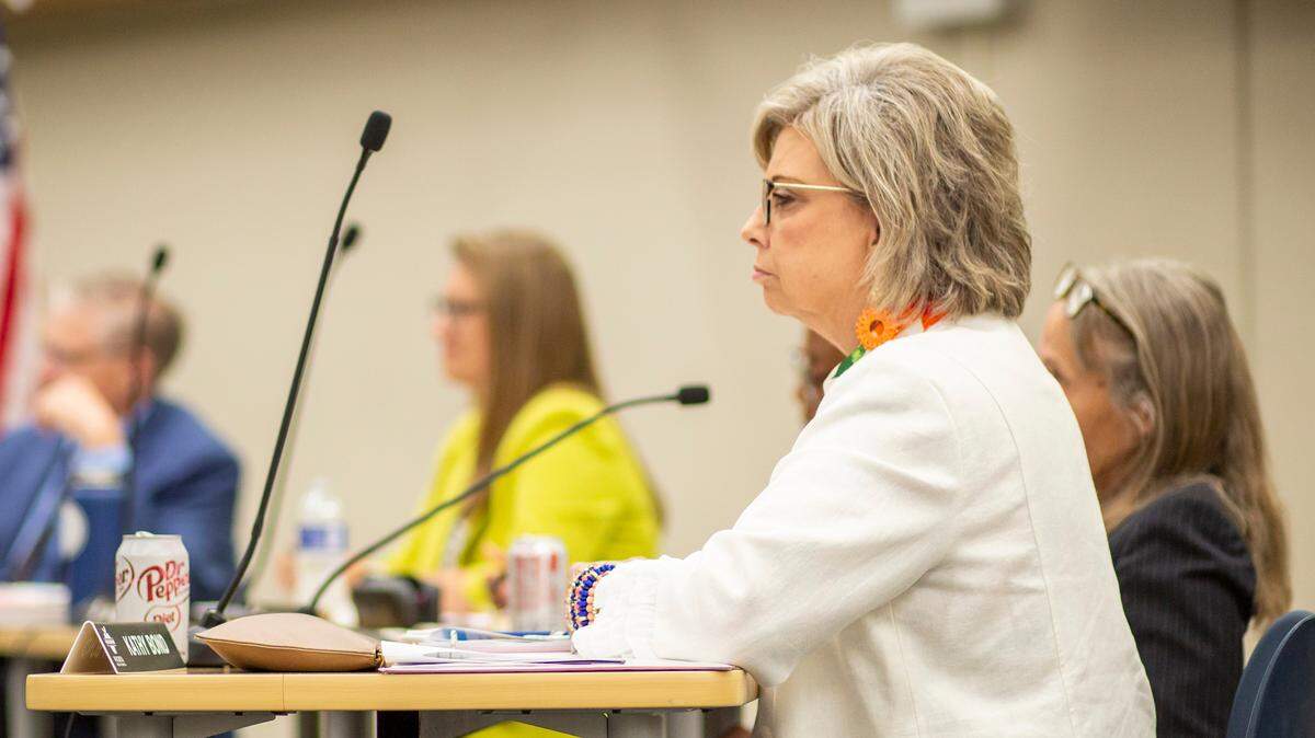 Wichita school board member Kathy Bond listens to a consultant hired to help the district craft its facilities master plan. Bond and the the board’s other two conservative members have said they have concerns with the size of the $450 million bond issue proposal that the consultant, Woolpert, has recommended.