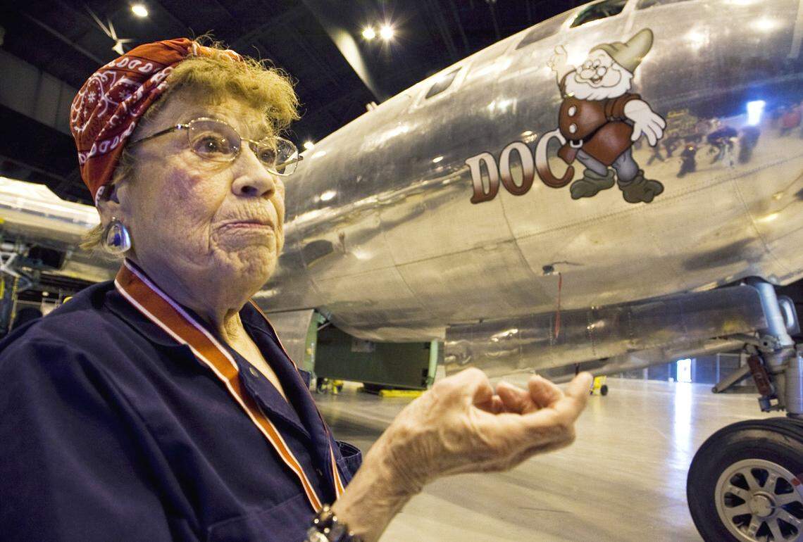 Connie Palacioz pictured with Doc, which she helped build during World War II and then rebuild decades later. “She considered Doc her airplane, and she was madly passionate to tell her story and tell her story of those who served with her,” said Josh Wells, executive director of B-29 Doc.