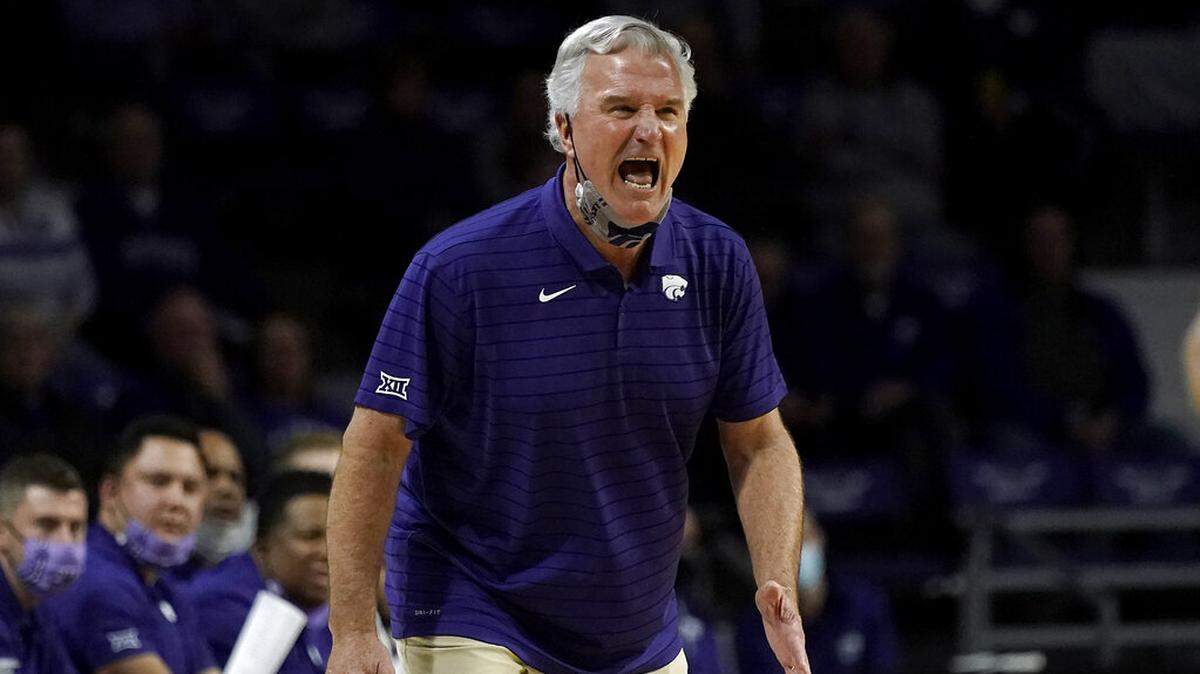 Kansas State head coach Bruce Weber talks to his players during the first half of an NCAA college basketball game against Omaha Wednesday, Nov. 17, 2021, in Manhattan, Kan. (AP Photo/Charlie Riedel)