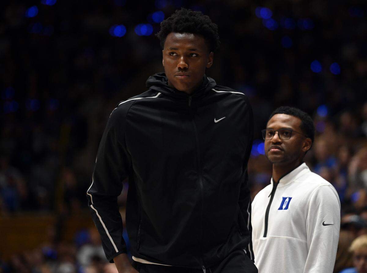 Class of 2024 college basketball recruit Patrick Ngongba, left, during Duke’s Countdown to Craziness event in October at Cameron Indoor Stadium.