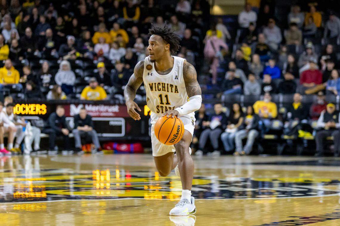 Wichita State point guard Justin Hill looks to attack in the first half against East Carolina in Saturday’s game at Koch Arena.