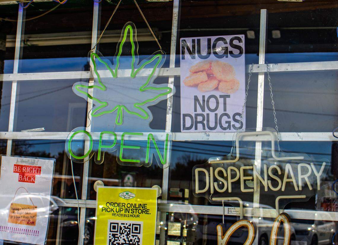 The window of the High Hopes ICT storefront at 3108 W. 13th St. sits dark after the business's owner and an associate were arrested.