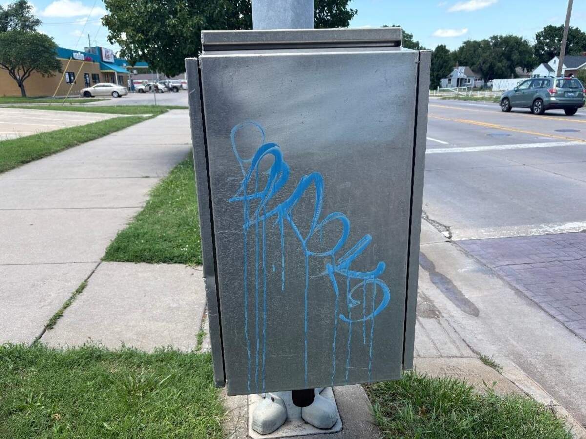 A graffitied electrical box on 21st Street is one of the more recent pieces of city infrastructure cleaned up and repainted by volunteers with the Juda Graffiti Removal and Deterrence Task Force, which was established by the Tribal Council of Chiefs of the Holy Kingdom of Juda.