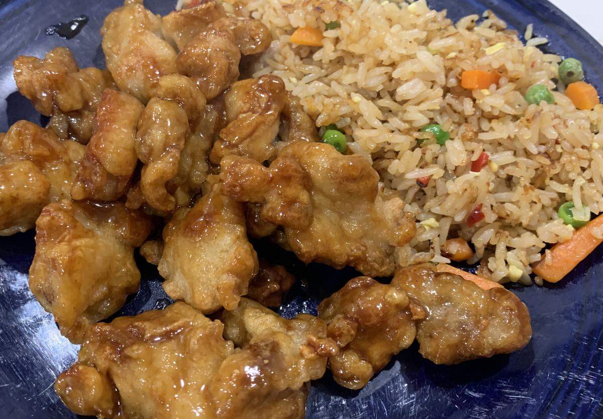 Trader Joe’s frozen mandarin orange chicken and fried rice make for a quick, easy and tasty meal.