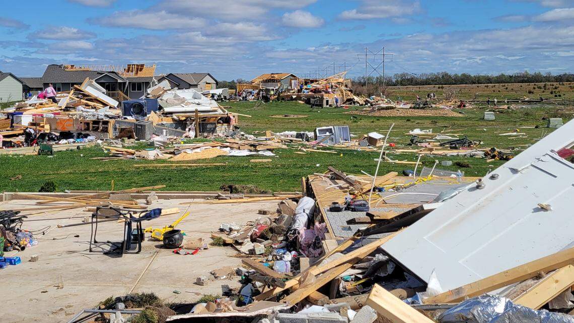 Friends, neighbors and strangers help Andover tornado victims pick through the rubble