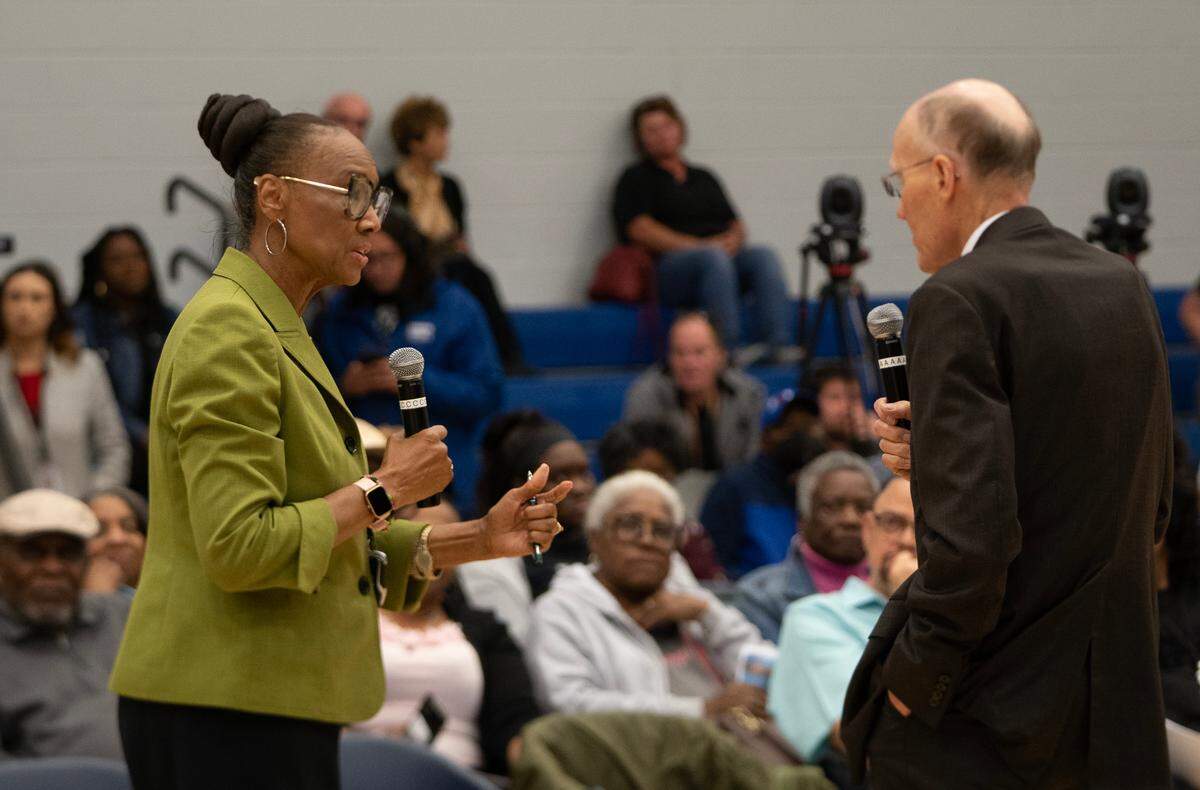 Lavonta Williams asks Sedgwick County Health Officer Dr. Garold Minns a question during a public meeting in 2023 at the Boys and Girls Club, 2400 N. Opportunity Drive. The Kansas Department of Health and Environment held the meeting to discuss the 29th and Grove Environmental Site health study. (May 19, 2023)