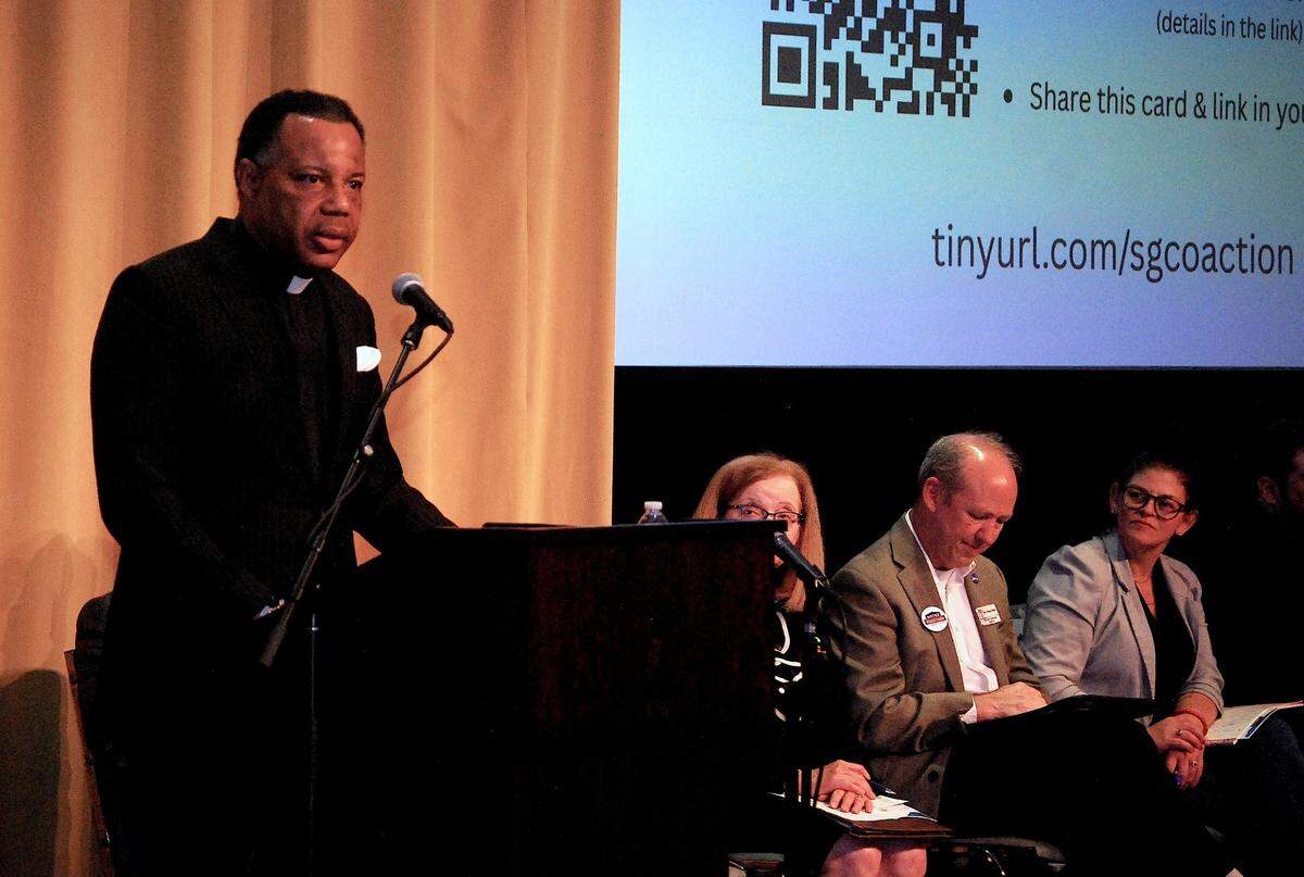 The Rev. Kevass Harding tells 1,300 members of Justice Together that “this isn’t the end, it’s just the beginning” of the faith-based movement to help solve homelessness and the housing crisis.