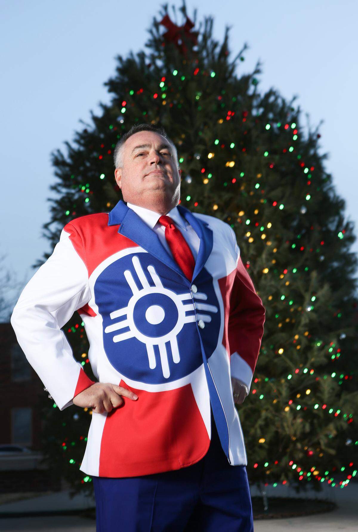 Wichita city council member Bryan Frye sports his custom-made Wichita flag suit. Frye had the suit fabricated at local band-uniform supplier Fruhauf. (December 23, 2018)