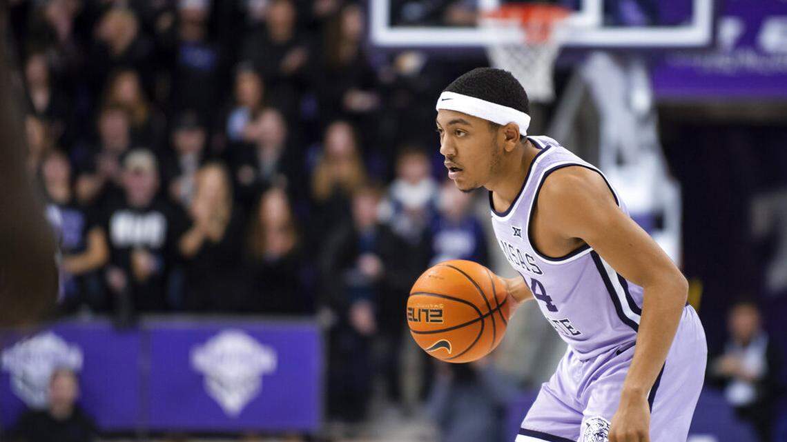 Kansas State guard Nijel Pack (24) waits for a teammate to give him a screen in the first half of an NCAA college basketball game against TCU in Fort Worth, Texas, Saturday, Feb. 5, 2022. (AP Photo/Emil Lippe)