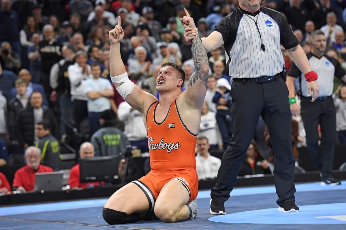 Newton native Wyatt Hendrickson celebrates after becoming a national champion at the NCAA Men’s Wrestling Championship in Philadelphia on Saturday.