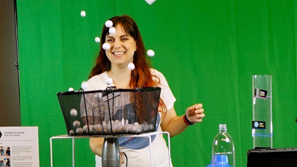 Victoria Mitchell, Exploration Place Education Manager, leads a star formation demo during a Camp in a Box session, last year. Sessions during 2021 spring break include sci-fi frontiers and spy training.