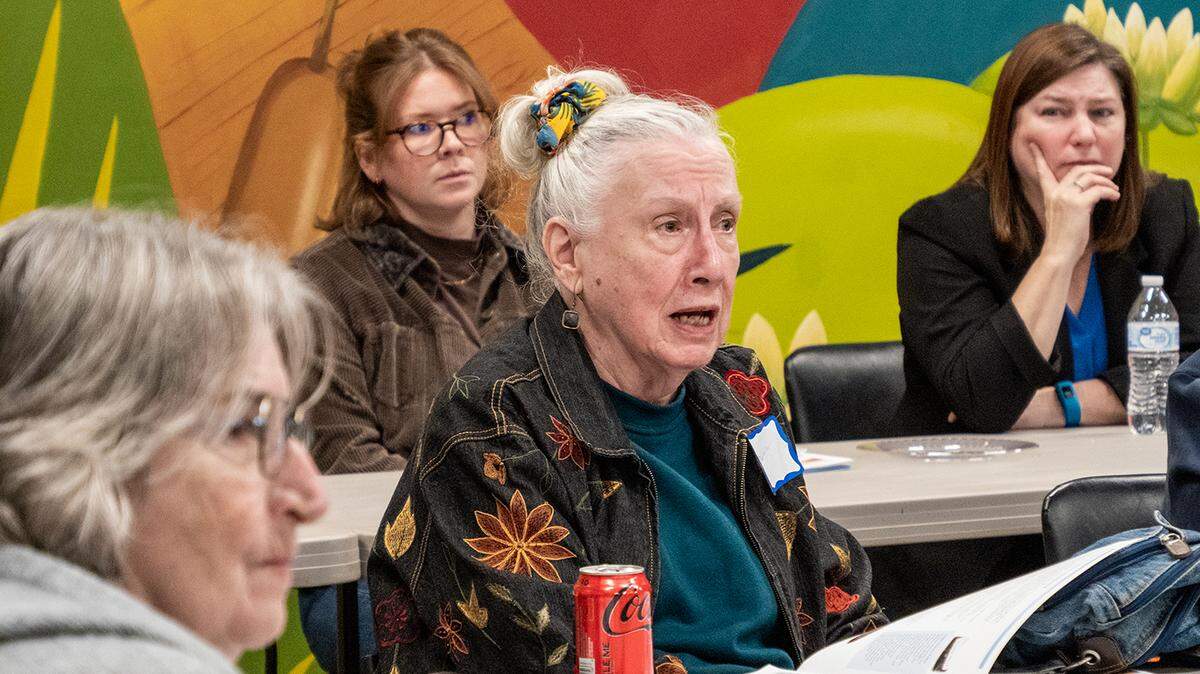 Dee Miller voices concerns with assisted living options for her disabled husband during a Nov. 12, 2024, forum hosted by Kansas Advocates for Better Care at Baker Wetlands Discovery Center. (Sherman Smith/Kansas Reflector)
