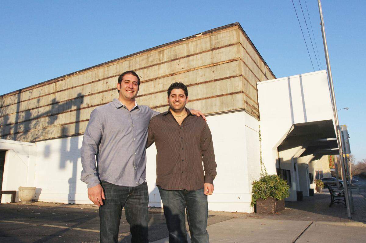Brent Steven, left, and his brother Brad are pictured in 2012 when they first announced plans to put The Hill Bar & Grill in part of the old Barrier’s space at Douglas and Oliver.