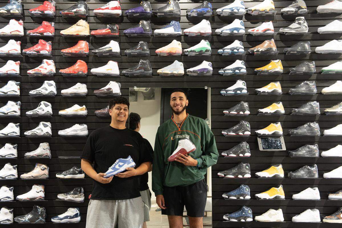 Knockout Sneaker Boutique co-owners Michael Reyes, left, and Cade McGaugh along with partner Ernesto Hernandez, not pictured, have opened in a 3,500-square-foot space at 600 E. Douglas that has room for walls of tennis shoes and space for two other businesses as well.