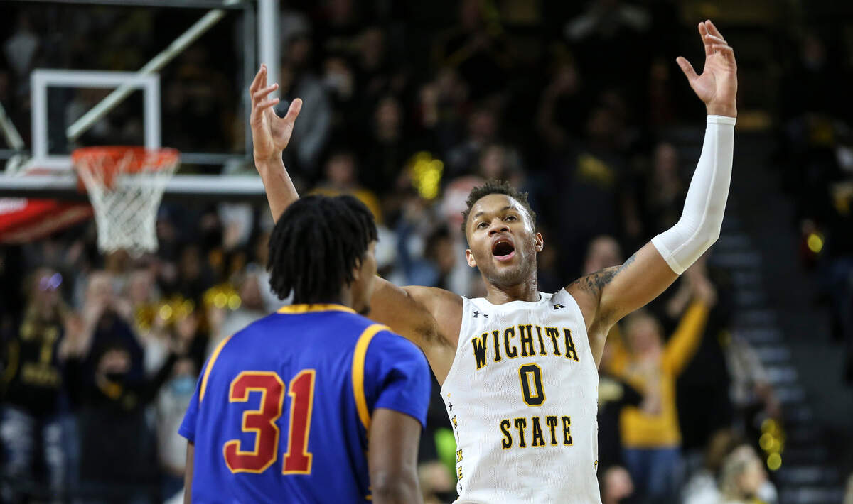Wichita State’s Dexter Dennis celebrates a three-pointer late in the second half against Tulsa at Koch Arena.