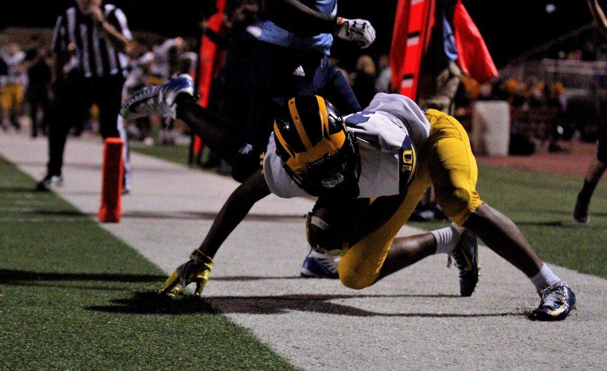 Wichita Northwest senior receiver Jamir Cupps reeled in a touchdown in the Grizzlies’ 56-0 win over the Blue Aces on Thursday night. (Sept. 6, 2018)