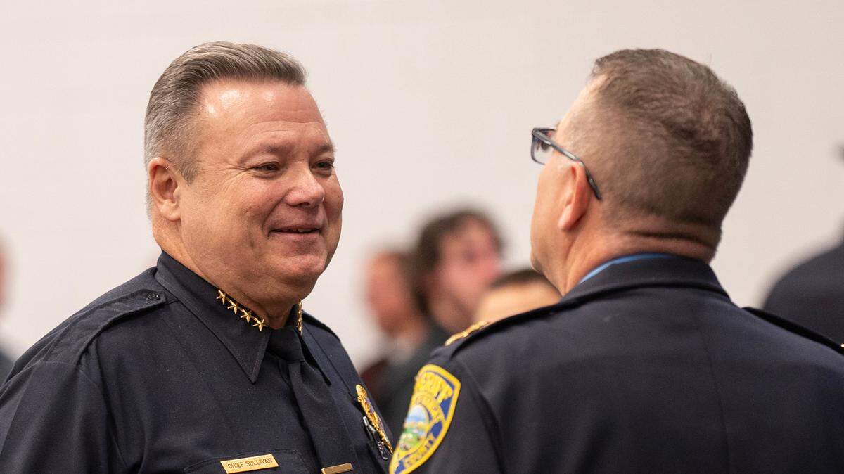 Wichita Police Chief Joe Sullivan, left, talks with Sedgwick County Sheriff Jeff Easter during a November service that honored fallen Sedgwick County Sheriff’s Office K-9 Bane. “I think he has made a lot of great strides for the police department,” Easter said of Sullivan.