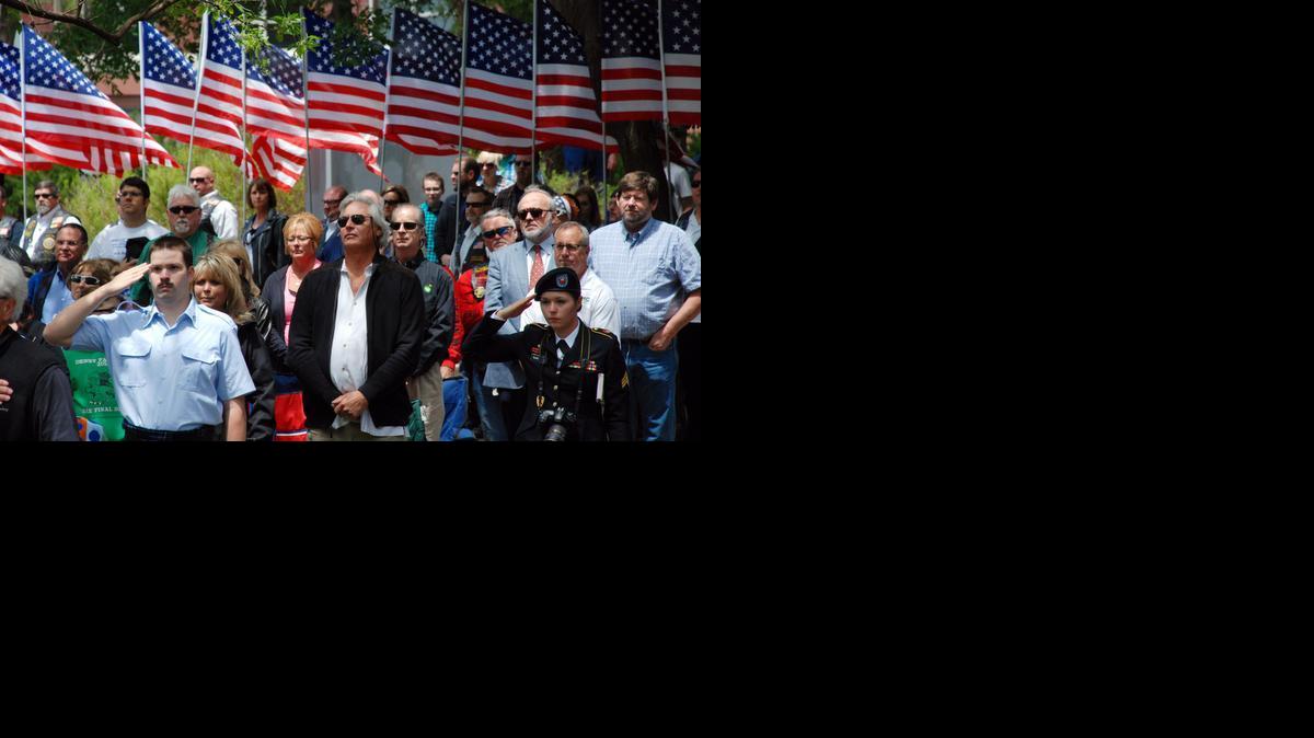 A large crowd was on hand at the dedication ceremony for the Kansas Operation Freedom Memorial at Veterans Memorial Park. (May 17, 2014)